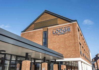 The Lodge hotel exterior logo
